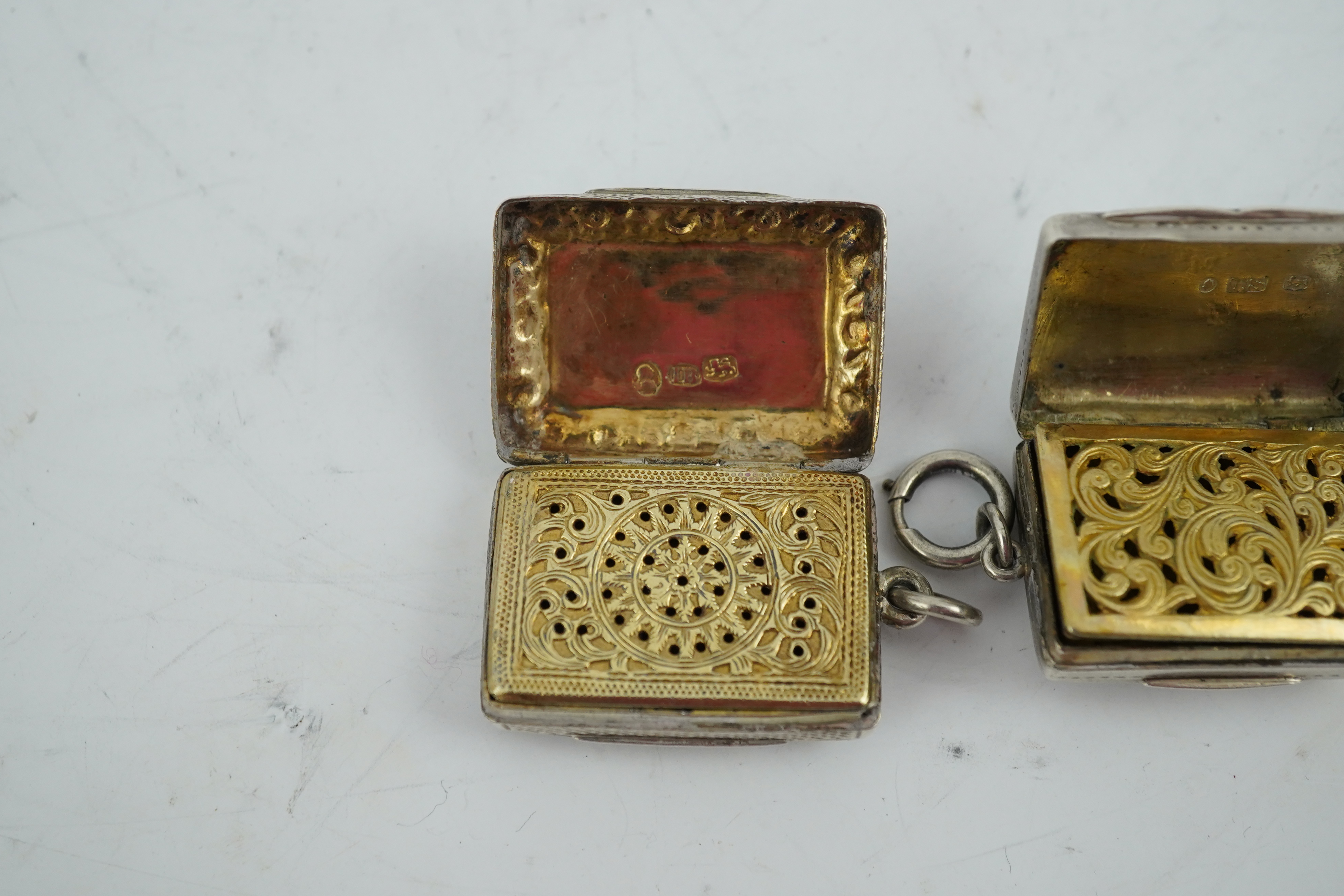 A George IV engraved and embossed silver rectangular vinaigrette by John Bettridge, Birmingham, circa. 1825, 32mm and a William IV vinaigrette by Thomas Simpson Jn. Birmingham, 1836.